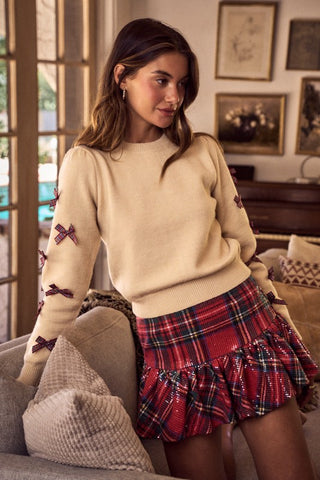 Beige Holiday Sweater with Plaid Bows – Cozy Winter Knitwear