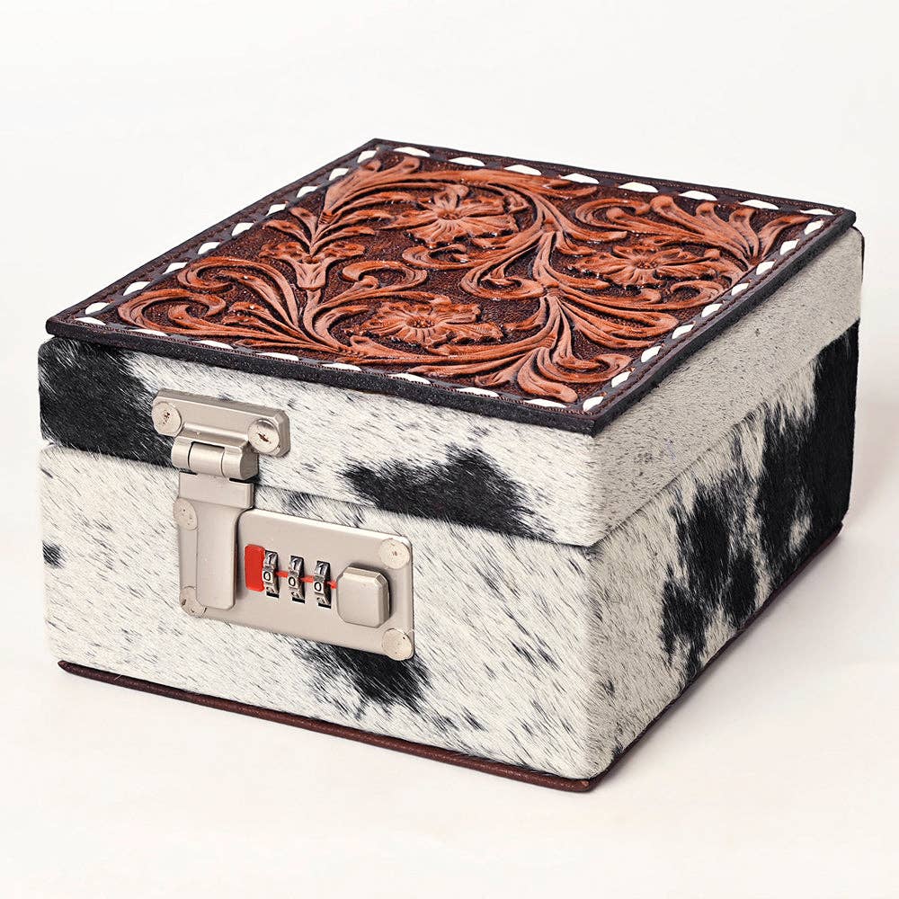 Keepsake Trail Leather Jewelry Case with hand-tooled floral carving and cowhide design, perfect for handbags and travel.